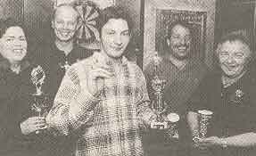 The winners of the darts competition